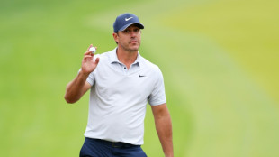 Koepka turns boos to roars in grabbing PGA lead at rainy Oak Hill