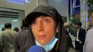 Una multitud recibe en Ir&aacute;n como una hero&iacute;na a escaladora que compiti&oacute; sin hiyab