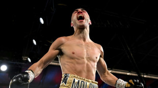 Aussie Moloney wins world crown while Alimkhanuly keeps title