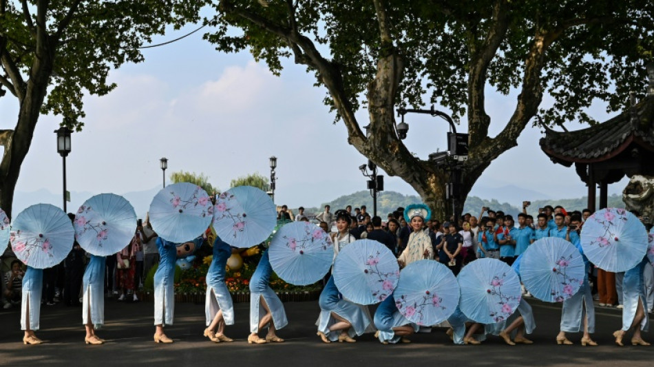Thousands turn out for launch of Asian Games torch relay in Hangzhou
