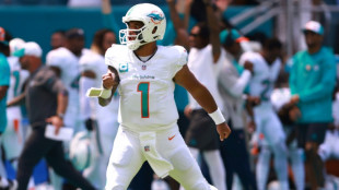 NFL Dolphins destroy Denver 70-20, Chiefs tame Bears