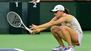 Rib injury threatens beaten Swiatek's Miami Open defense