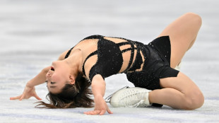 Sakamoto hits high notes to lead at skating worlds