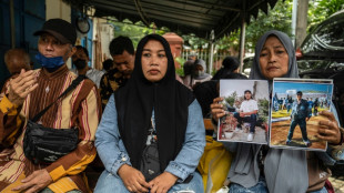 Five go on trial for negligence over Indonesia stadium disaster