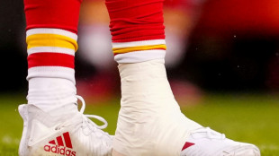 Limping Mahomes and Chiefs hold off Jaguars,  Eagles advance