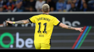 Fuellkrug, Reus special help 10-man Dortmund beat Hoffenheim to go top  
