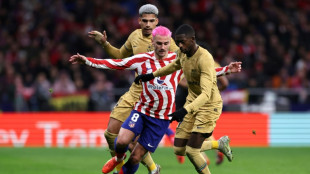 Dembele earns Barca La Liga advantage in tense Atletico triumph