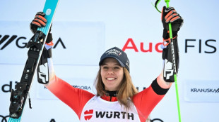 Swiss skier Rast wins giant slalom, pays tribute to Crans-Montana victims