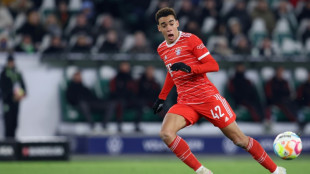 Musiala shines as 10-man Bayern go top despite Neuer row