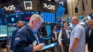 Wall Street en hausse, satisfaite par l'inflation et les r&eacute;sultats des banques