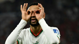 Morocco roar past Canada into World Cup last 16
