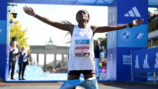 'Happy' Assefa smashes women's marathon world record in Berlin, Kipchoge wins men's race