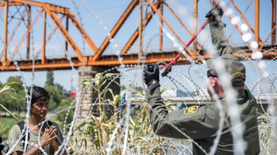 Cat and mouse on US border as federal, state forces compete