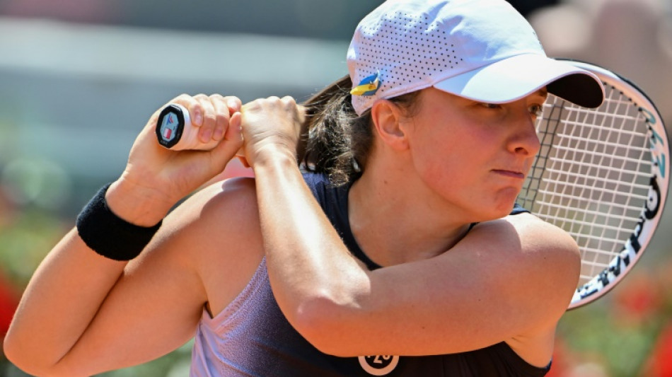 Swiatek sweeps into Italian Open last 16, Medvedev triumphs