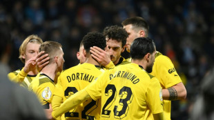 Long-range Can, Reus see Dortmund into German Cup quarters