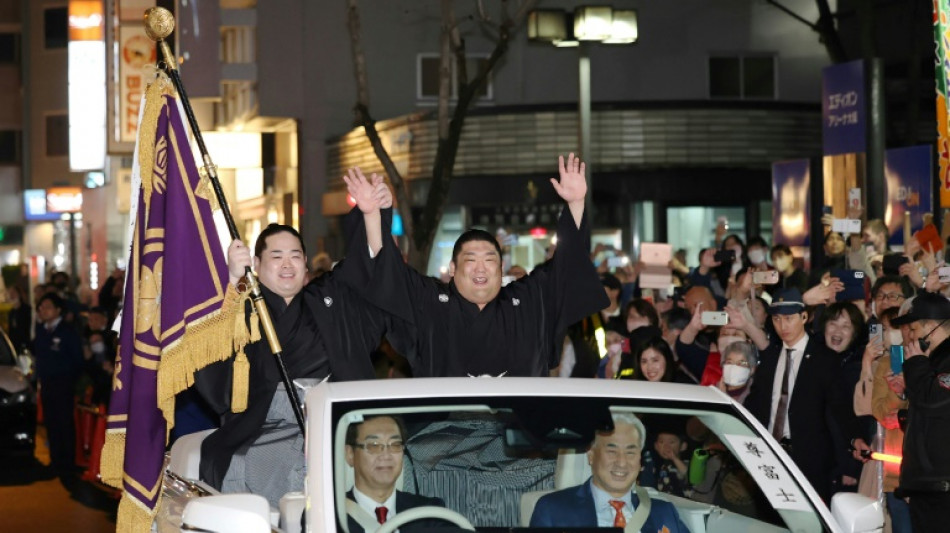 Rookie makes sumo history after winning top tournament