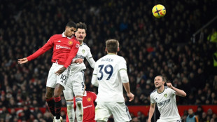 Sancho salvages Man Utd draw with managerless Leeds