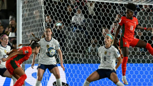 USA survive Portugal scare to reach World Cup last 16