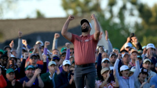 Ice-cool on course, Rahm submits to 'wave of emotion'