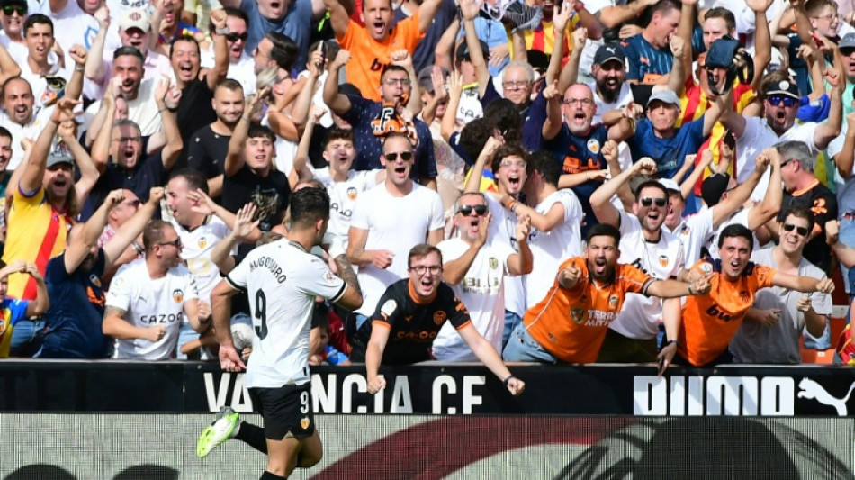 Valencia stun Atletico as Duro hits two