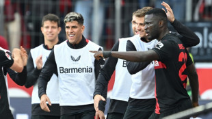 Slick Leverkusen sink derby rivals Cologne to go top