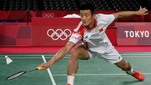 Badminton great Chen Long 'full of emotion' as he retires at 34