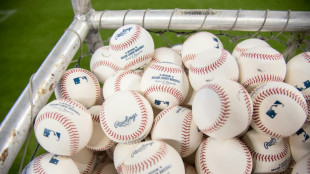 MLB permanently adopts automatic runner in extra innings