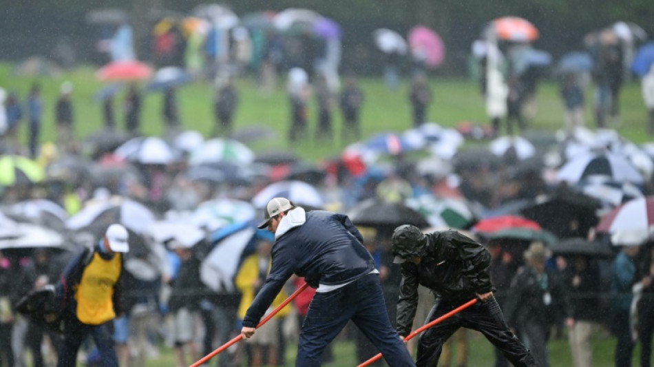 PGA leaders launch third round at rain-soaked Oak Hill