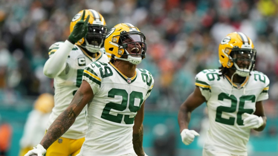 Packers defeat Miami to boost NFL playoffs hopes  