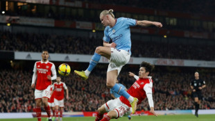 Arsenal seek swift response to take title fight to Man City