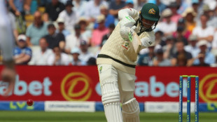 Khawaja keeps England at bay after Broad strikes in Ashes opener