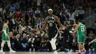 Holiday scores 40 as Bucks down Celtics in thriller