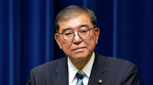 'Trump Whisperer' ex-minister joins Japan PM race
