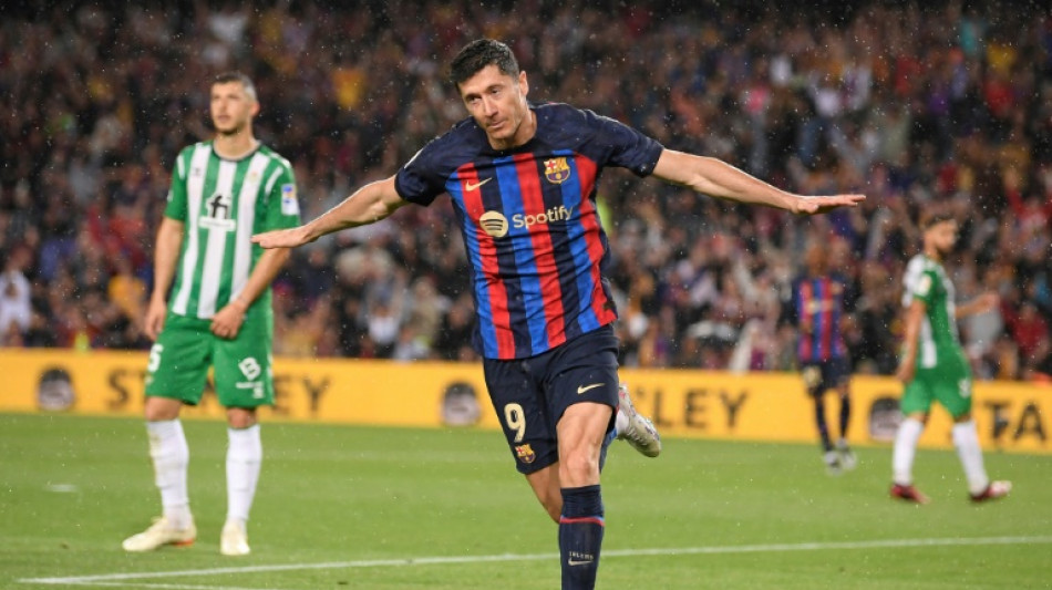Barca romp to victory over Betis with title in sight
