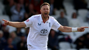 Robinson and Tongue share match ball after dismissing Pakistan 