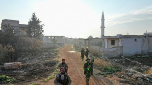 For&ccedil;as jihadistas entram na segunda maior cidade s&iacute;ria ap&oacute;s ofensiva rel&acirc;mpago