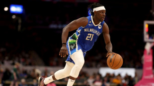 NBA Celtics land ex-Bucks guard Holiday from Portland: reports