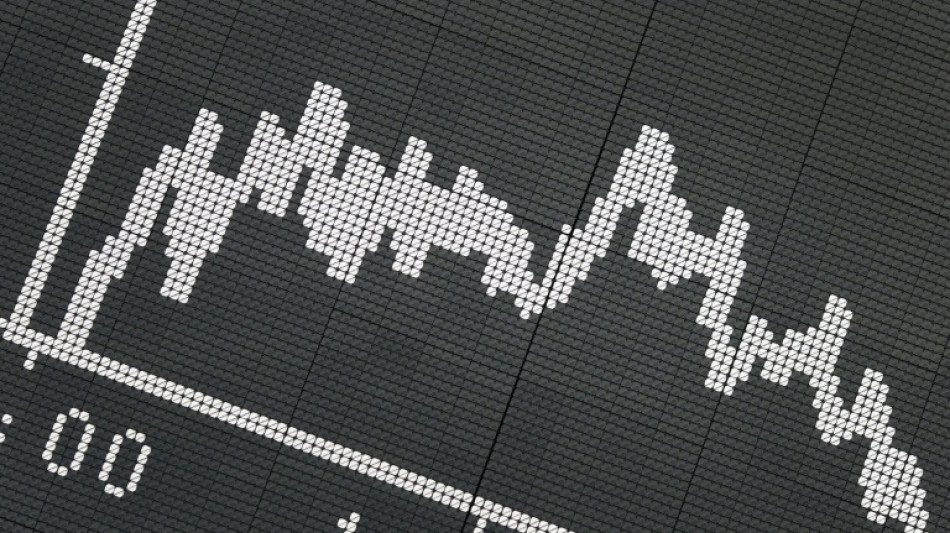 Asian markets fall, yen rallies after BoJ policy move