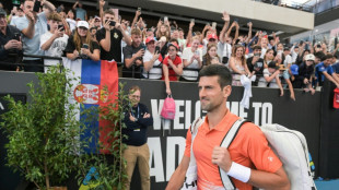 Djokovic romps in first singles clash in Australia since deportation