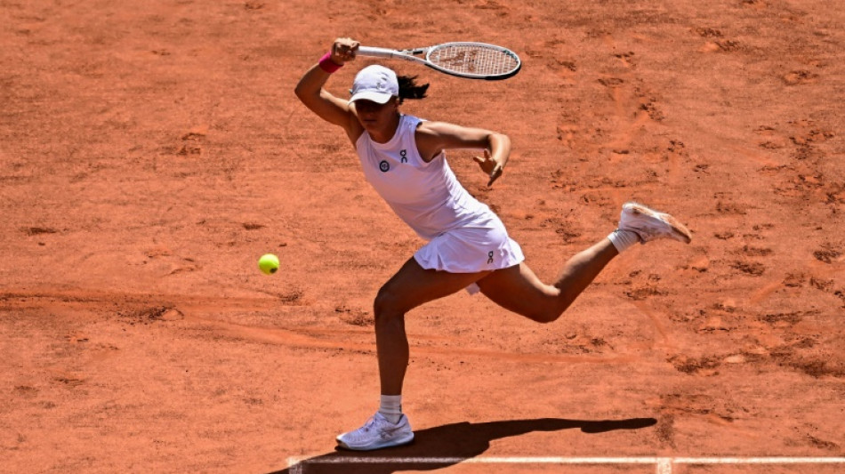 Swiatek fights off Muchova in thriller for third French Open title