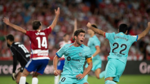 Barca make Granada comeback but lose ground in La Liga