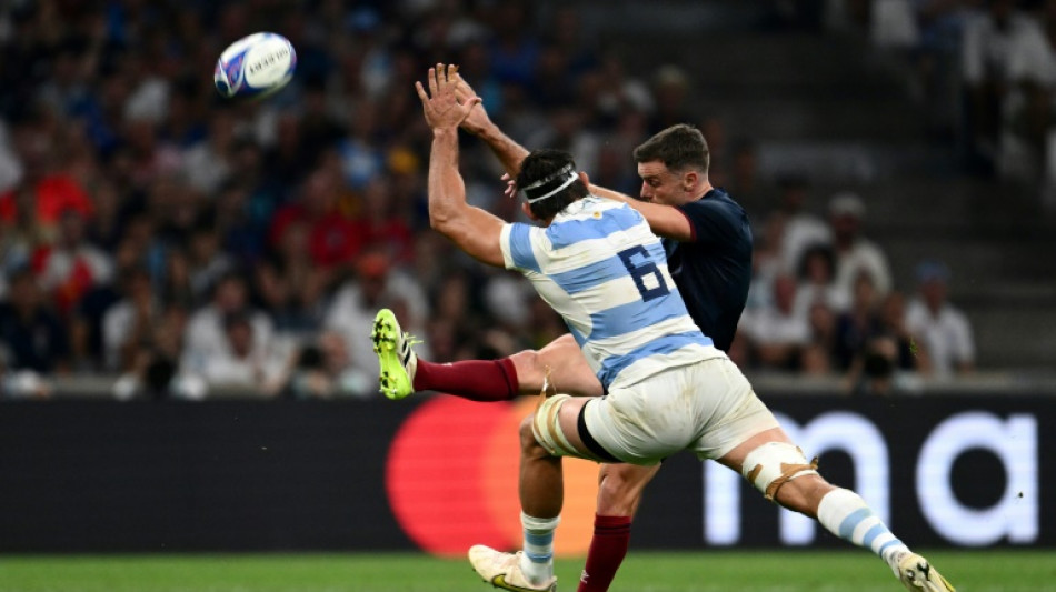 Ford kicks England past Argentina in World Cup opener